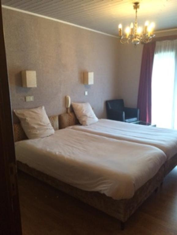 Hotel La Venerie Virton Quarto foto